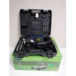 A boxed Powercraft hammer drill and a Gardenline push mower