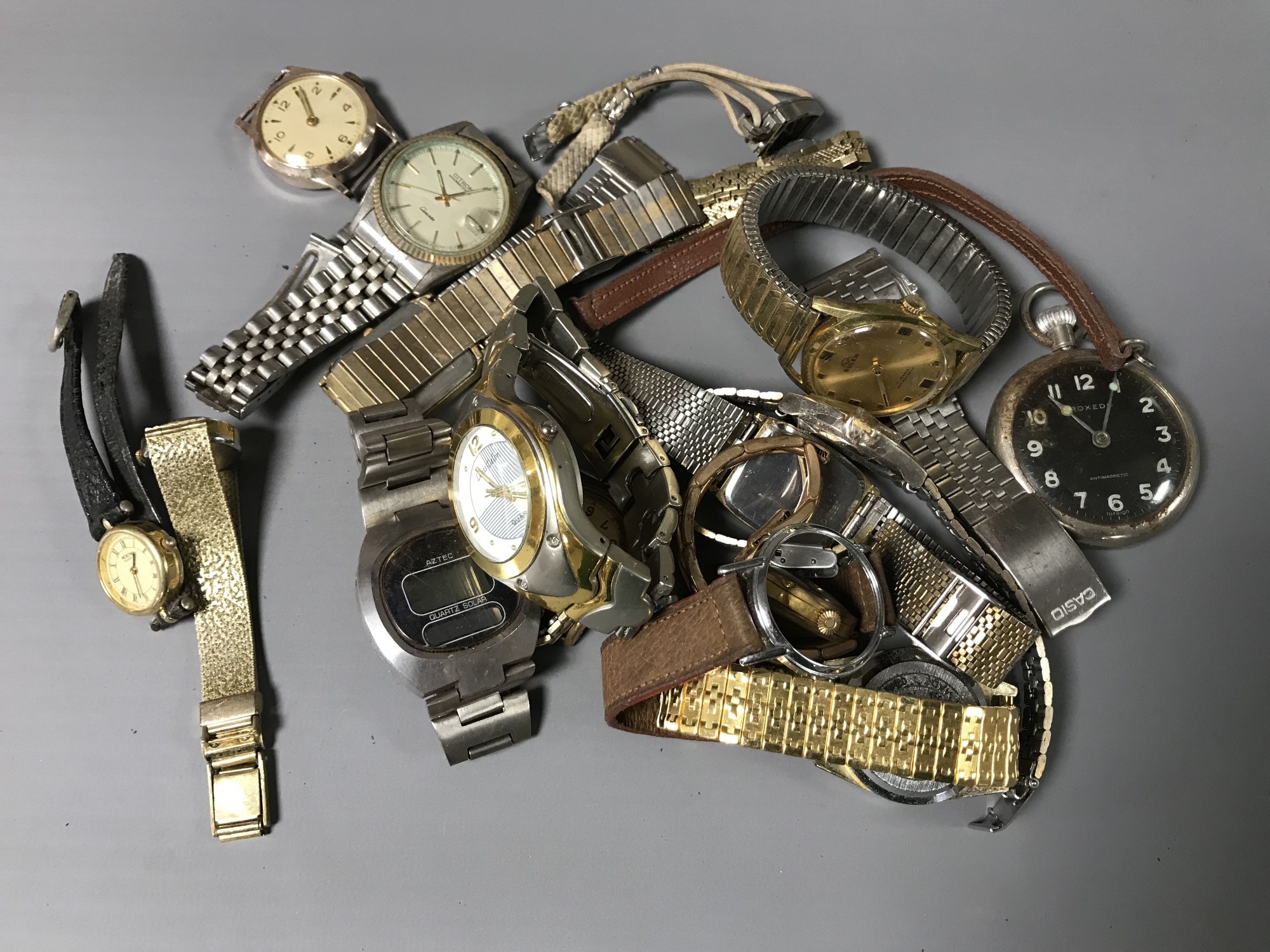 A collection of various watches (Q)