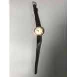 A 9ct gold Harwood wrist watch - * John Harwood is credited for inventing the first automatically