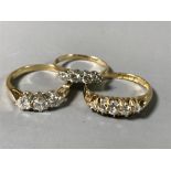 Three 18ct gold diamond set rings - three stone, four stone and five stone.