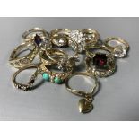 A collection of fourteen 9ct gold dress rings set with various stones, 42g.