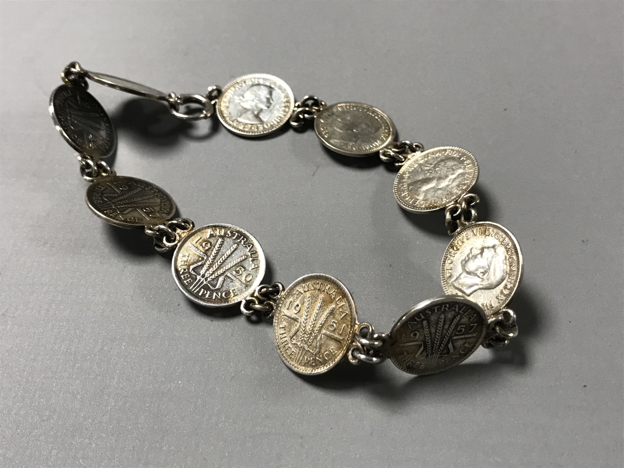 A silver Australia three pence coin bracelet