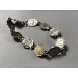 A silver Australia three pence coin bracelet