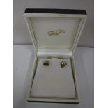 A pair of 9ct gold diamond set heart earrings