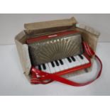 A Goldentone child's size accordion,