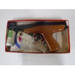 A Milbro G4 (.177 calibre) air pistol, in original card box, with targets, pellets, etc.