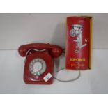 A vintage British Telecom red plastic telephone together with a boxed Spong mincer