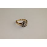 An 18ct gold diamond cluster ring