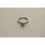 An 18ct white gold solitaire diamond ring