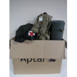 A box containing army surplus equipment, including British army and RAF shirts, rolled matt,