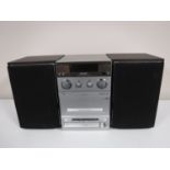 A Panasonic stereo CD system with speakers