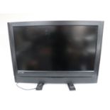 A Polaroid thirty two inch LCD TV with universal remote