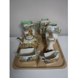 Seven pieces of Royal Doulton Dickens ware china