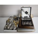 A tray containing an assorted quantity of boxed and unboxed cutlery