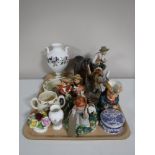 A tray containing a Beswick figure of a horse (brown gloss), continental figurines,