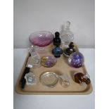 A tray of assorted glassware including perfume bottles, paperweights,