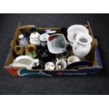 A box of assorted china, including pottery vases commemorative mugs, pewter tankards,