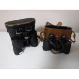A cased set of Greenkat 8x40 binoculars and a set of Wray of London 8x30 binoculars