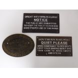 Three cast iron railway plaques and notices