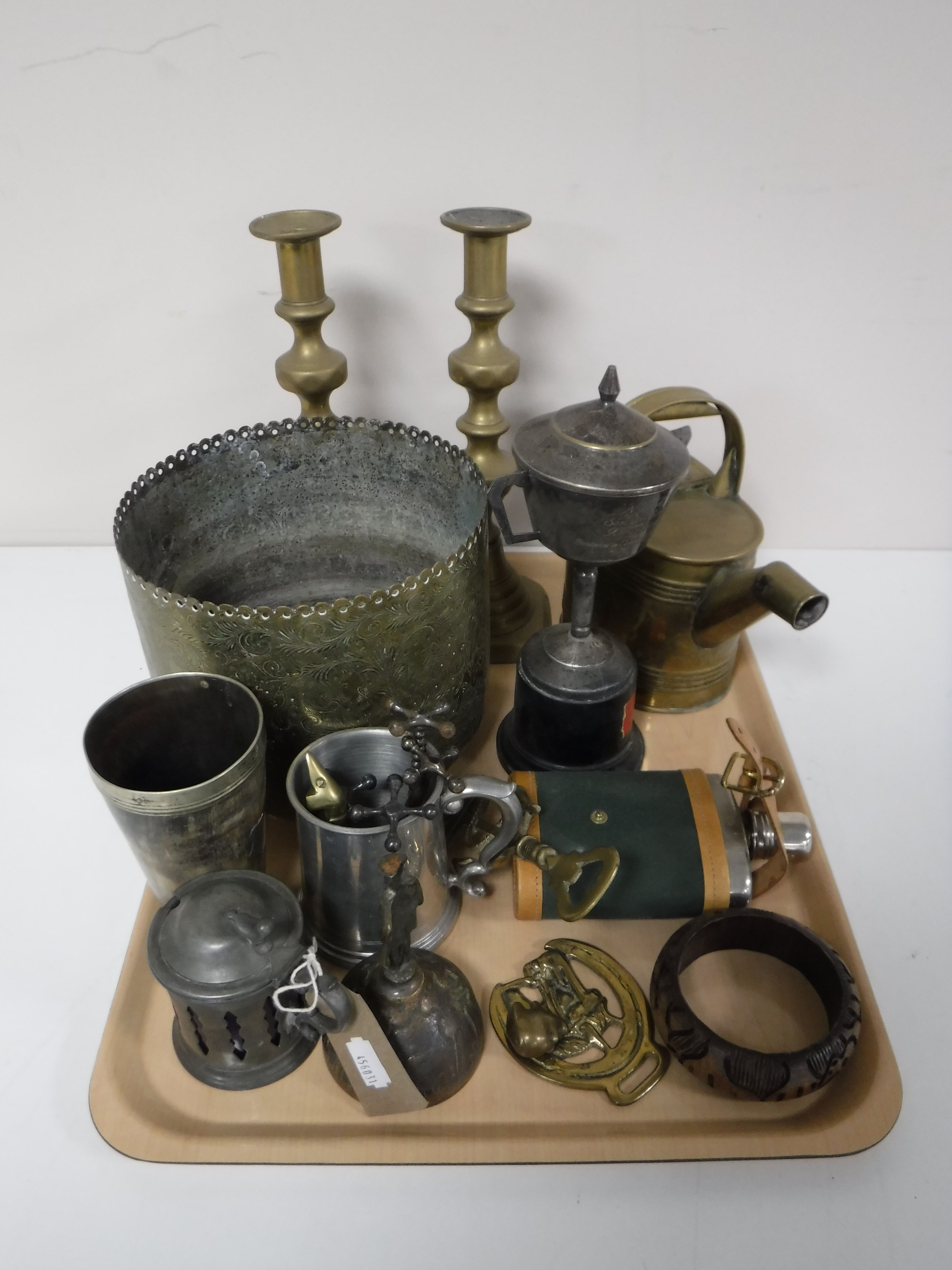 A tray containing plated ware, brass candle sticks, brass watering can, hip flask,