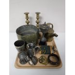 A tray containing plated ware, brass candle sticks, brass watering can, hip flask,