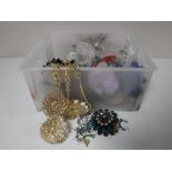 A tub containing a large quantity of costume jewellery