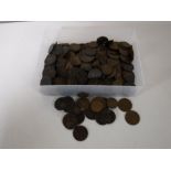 A tub containing a quantity of Victorian and Georgian pennies and half pennies