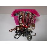 A box containing assorted costume jewellery