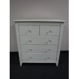 A painted pine five drawer chest