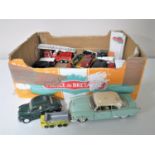 A box containing play-worn die cast vehicles