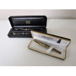 A pair of Parker Duofold fountain pens with 14ct gold nibs, boxed,