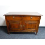 An early twentieth century oak linen chest,