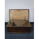 An antique pine blanket box