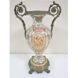 A continental china vase with gilt metal handles and on gilt metal base,