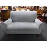 A contemporary two seater settee,