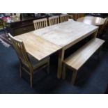 A contemporary oak dining table with two extension leaves,