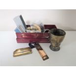 A box containing sterling silver napkin rings, crowns, pen nibs, plated tankard, bookmark,