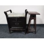 An Edwardian mahogany storage piano stool,