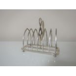 A silver seven-bar toast rack, Thomas Bradbury and Sons,