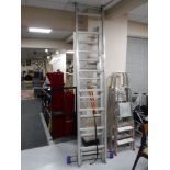 A two piece aluminium extending ladder,