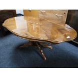 An Italianate pedestal coffee table