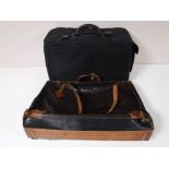 A Trussardi vintage leather case with a luggage case