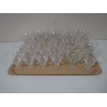 A tray of assorted drinking glasses