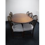 An eight piece mahogany dining room suite,