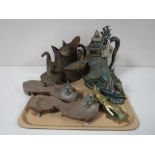 A tray containing Eastern metal tea pots, a brass oil can, a bronze figure of a Viking long ship,