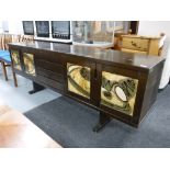 A late 20th century long john sideboard with tiled panel door inserts