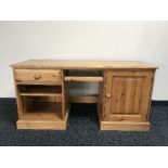 A pine knee hole computer desk