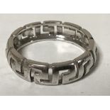 An 18ct white gold Versace ring, size P, 4.5g. CONDITION REPORT: The ring is 22.