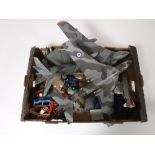 A box containing three large scale plastic military aircraft,