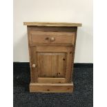 A reclaimed pine cupboard fitted a drawer